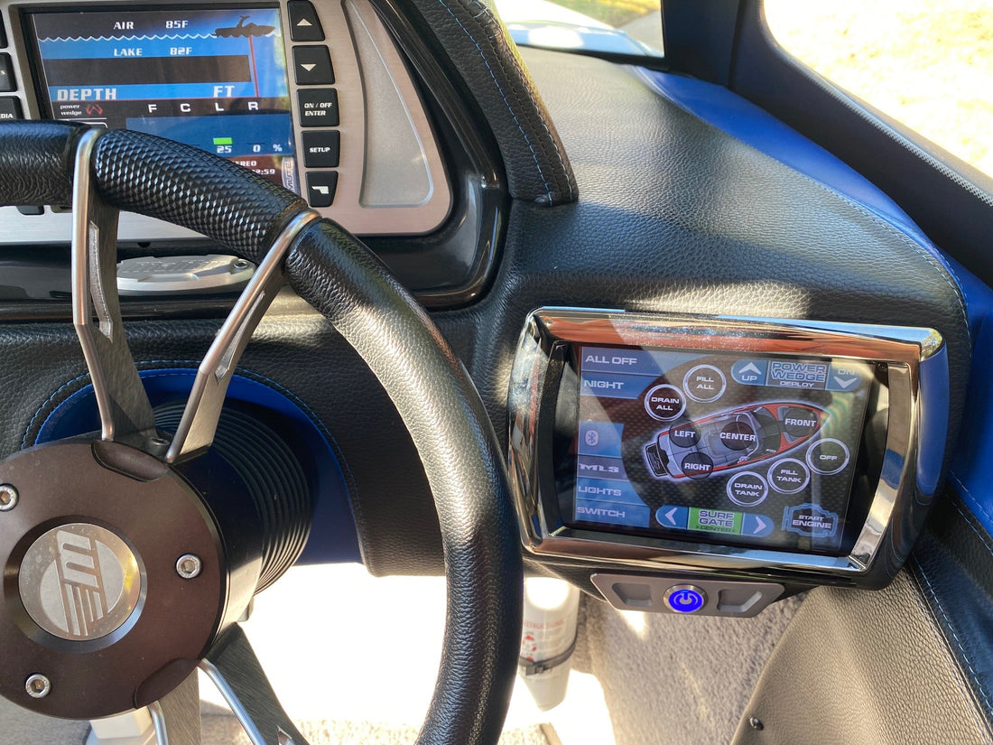 Malibu Wakesetter helm showing MTC Touch Command Center display with ballast controls and surf gate interface installed in boat